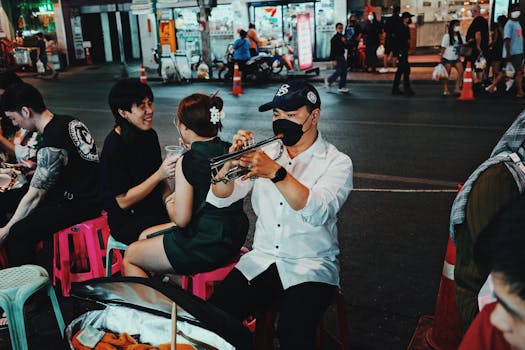 a vibrant street fair with people enjoying music