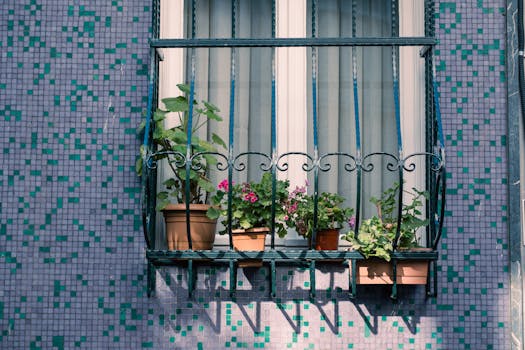 a peaceful garden in the city with flowers and greenery