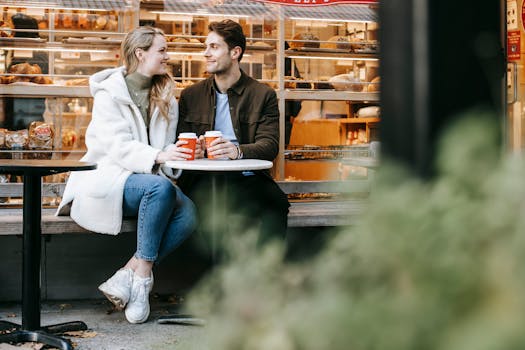 a couple enjoying coffee at a cozy café