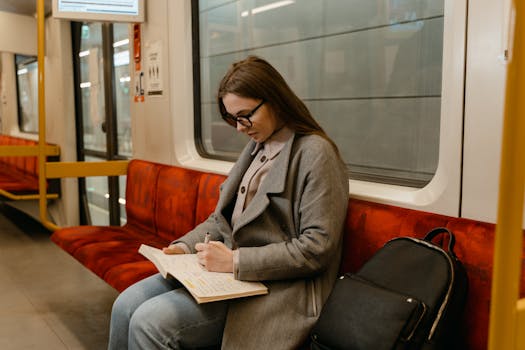 a commuter reading on public transportation